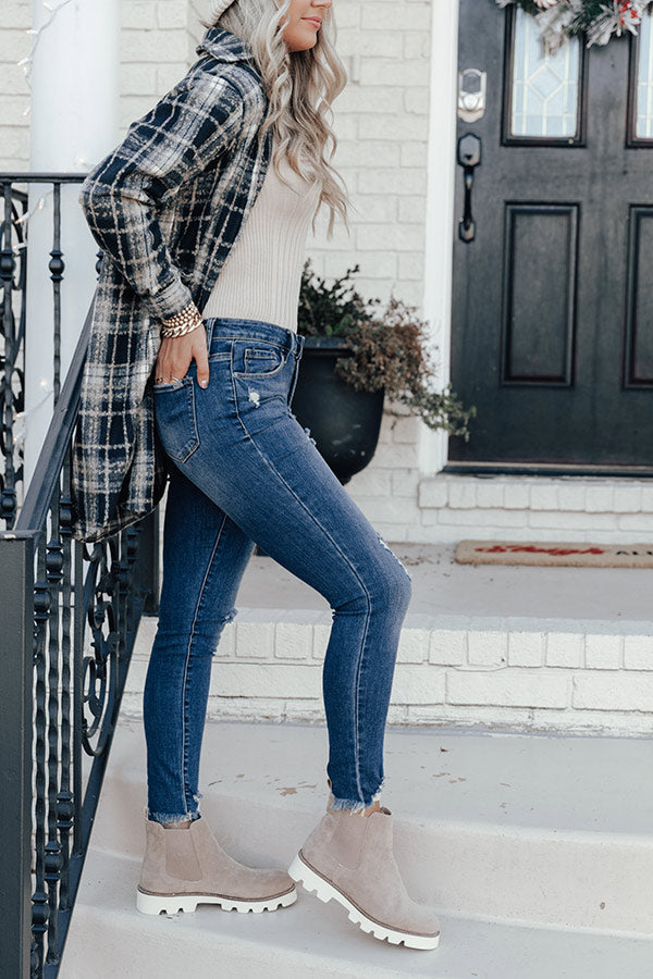 The Jenson Midrise Distressed Ankle Skinny