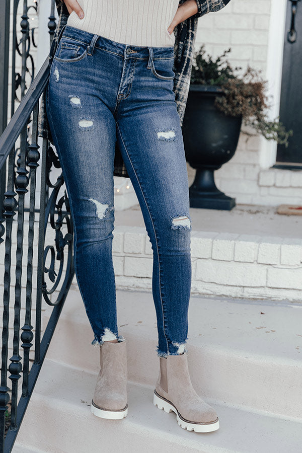 The Jenson Midrise Distressed Ankle Skinny