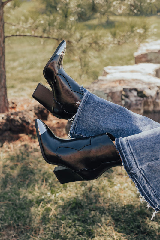 The Kaylie Faux Leather Bootie In Black