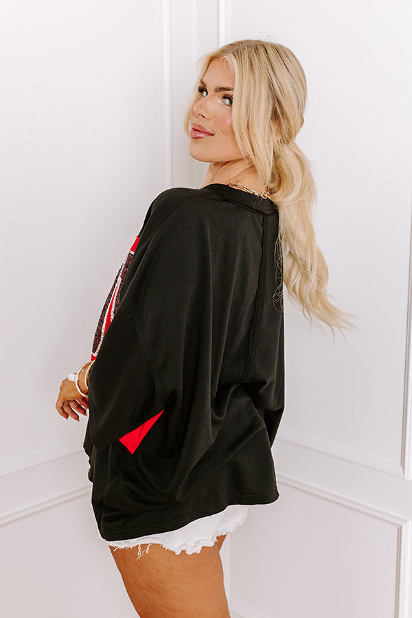 It's a Touch Down Sequin Oversized Tee in Black Curves