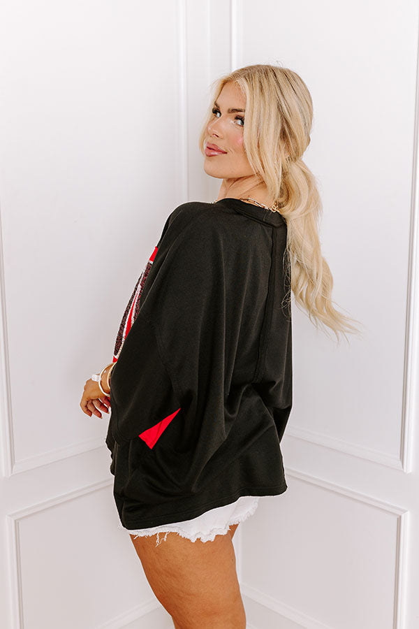 It's a Touch Down Sequin Oversized Tee in Black Curves