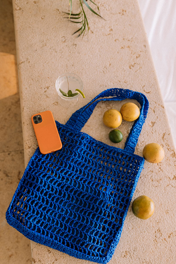 Somewhere In The Tropics Woven Tote In Royal Blue