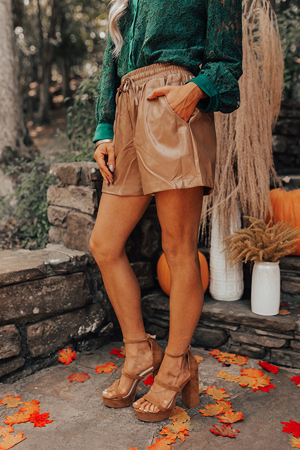 The Gibby High Waist Faux Leather Shorts In Brown