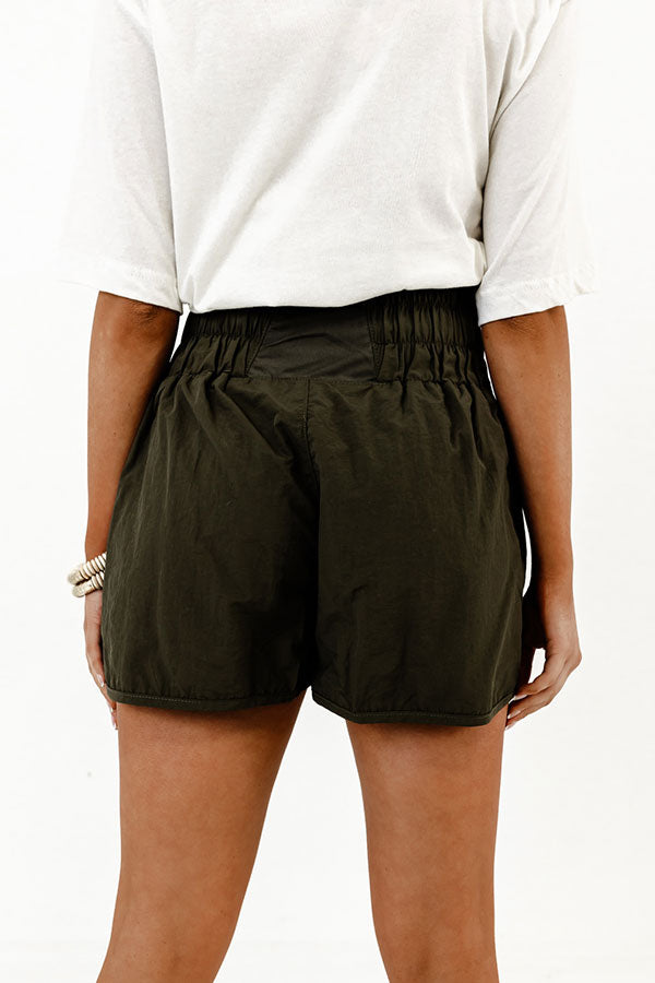 The Rainier High Waist Windbreaker Shorts In Dark Forest