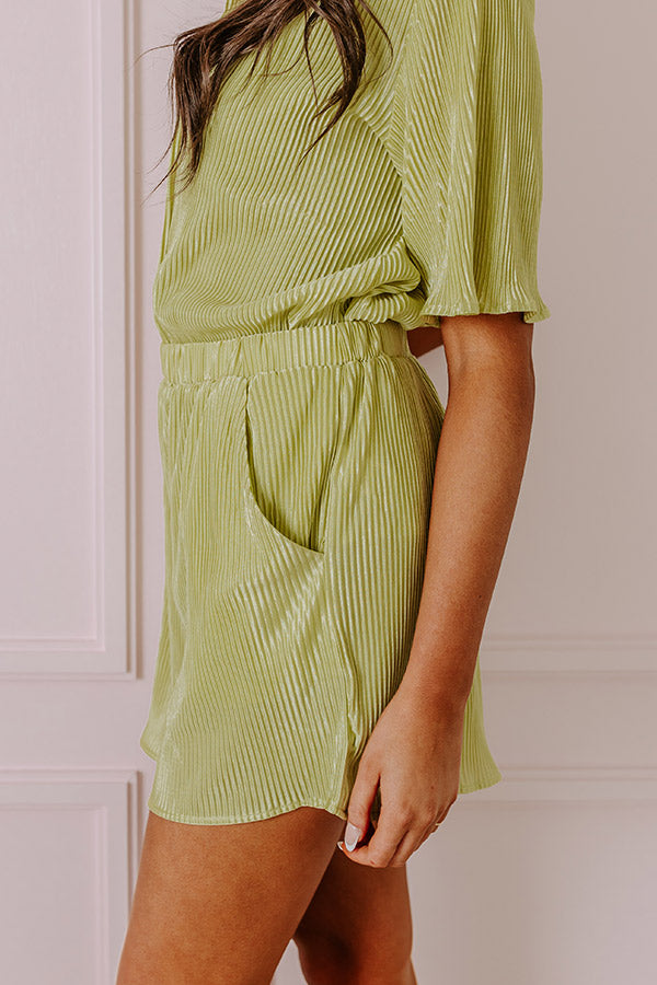 Tour The Town Pleated Shorts In Lime Punch