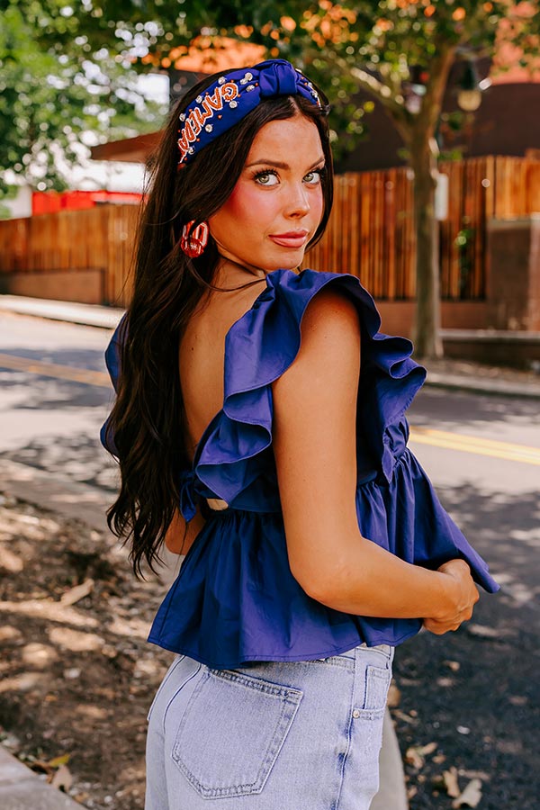 Stay Here Awhile Peplum Top In Navy