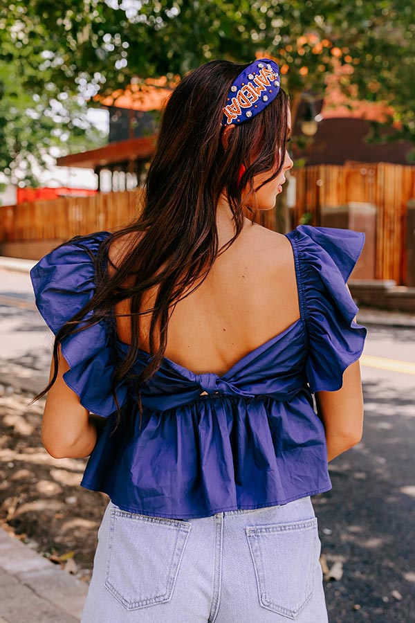 Stay Here Awhile Peplum Top In Navy