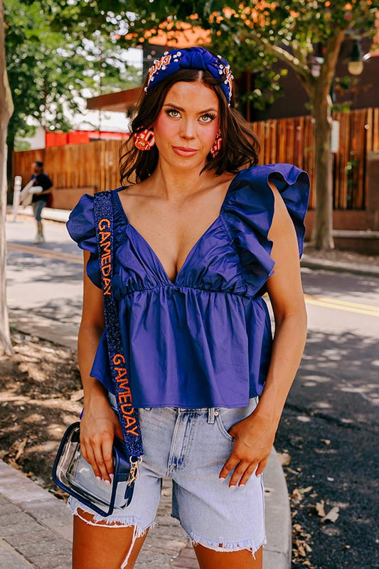 Stay Here Awhile Peplum Top In Navy