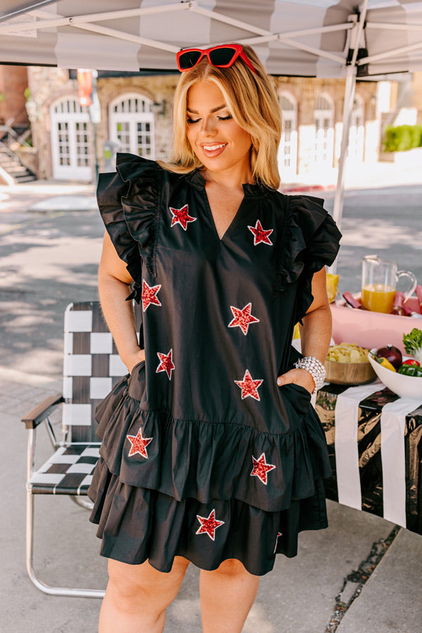 Under The Stadium Lights Ruffle Mini Dress in Black Curves