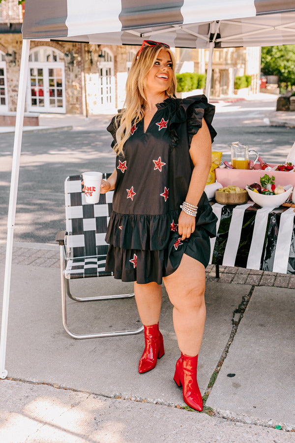 Under The Stadium Lights Ruffle Mini Dress in Black Curves