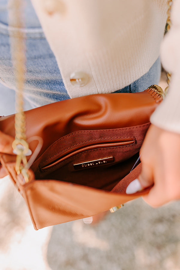 Leaving For London Faux Leather Crossbody in Brown